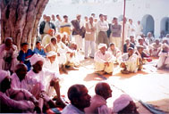 Men gathered at the free eye camp, village Gangaicha Ahir, Bikaner, District Rewari (2002)